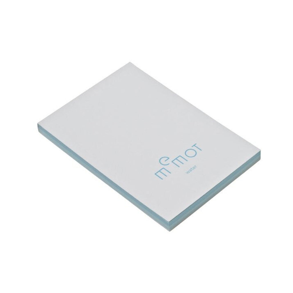 Angled view of memot notepad with blue-tinted pages and 'water' label on the cover.