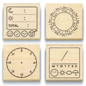 Kodomo No Kao planner stamps, mdae out of wood with rubber imprint section.