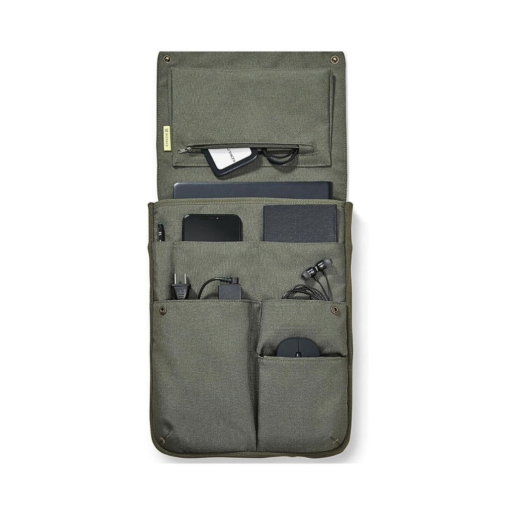 Kokuyo Bizrack Bag-in-Bag in vertical olive green showing inner pockets with pens and accessories stored inside.