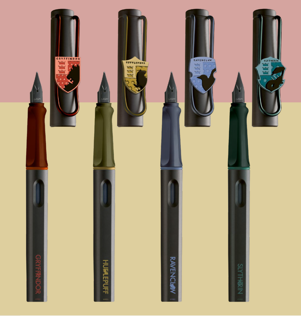 The Journal Shop - Close-up of the four Lamy Safari Harry Potter Fountain Pens representing Gryffindor, Hufflepuff, Ravenclaw, and Slytherin.