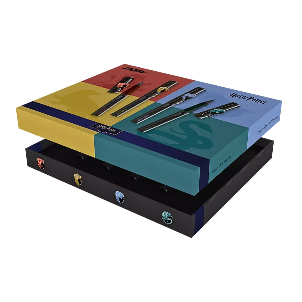 The Journal Shop - Boxed set of Lamy Safari Harry Potter Fountain Pens featuring all four Hogwarts House colours: red, yellow, blue, and green.
