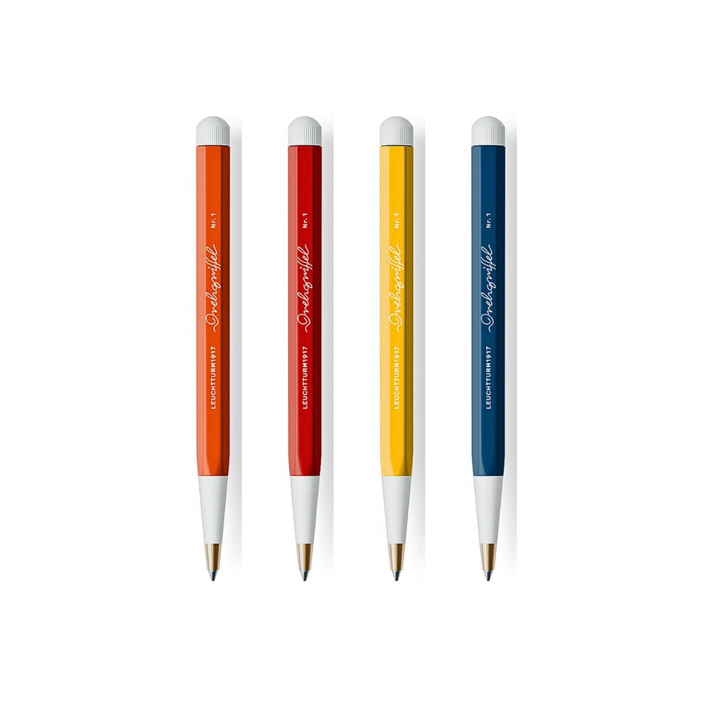 The Journal Shop - Four Leuchtturm1917 Drehgriffel Nr. 1 Gel Pens in orange, yellow, red, and navy blue with white twist tops and tips.