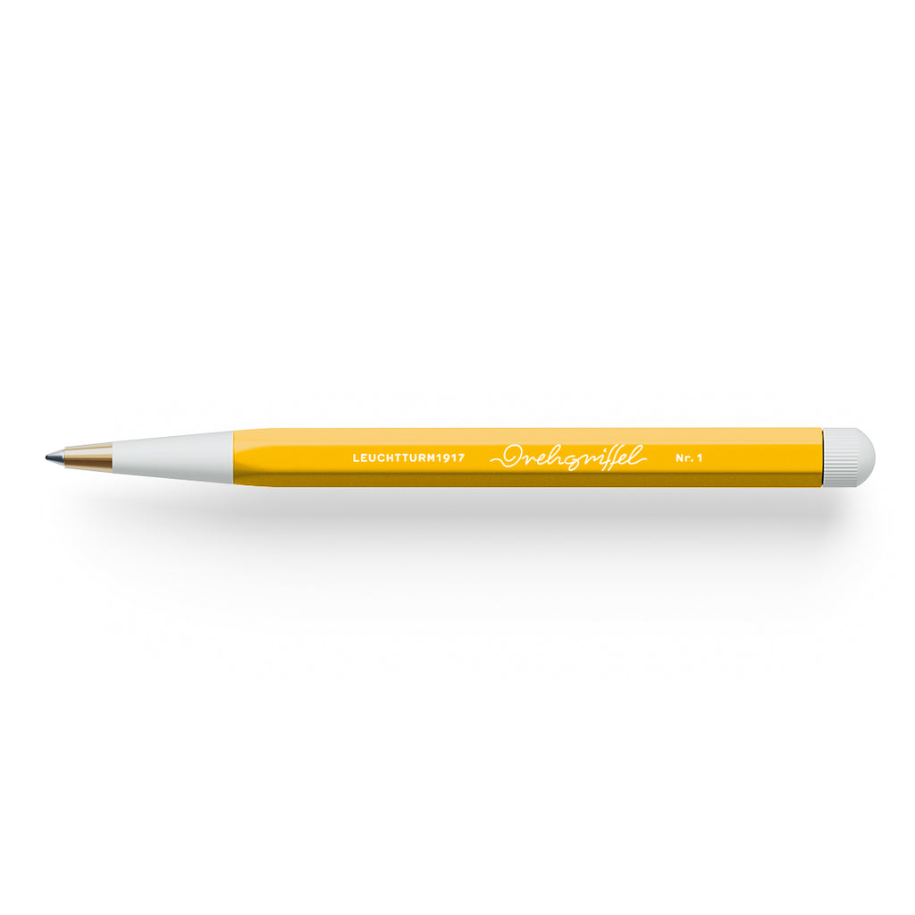 The Journal Shop - Yellow Leuchtturm1917 Drehgriffel Nr. 1 Ballpoint Pen with white twist top and smooth barrel, photographed side-on.