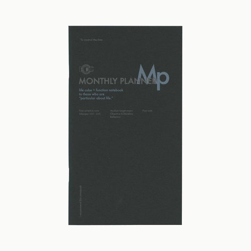 Front cover of Luddite Monthly Planner in black, A5 slim notebook with minimalist design