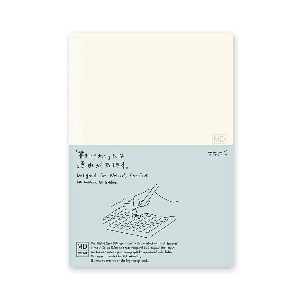 Midori MD Paper Notebook A5 Grid shown in original packaging with light blue wrap band.