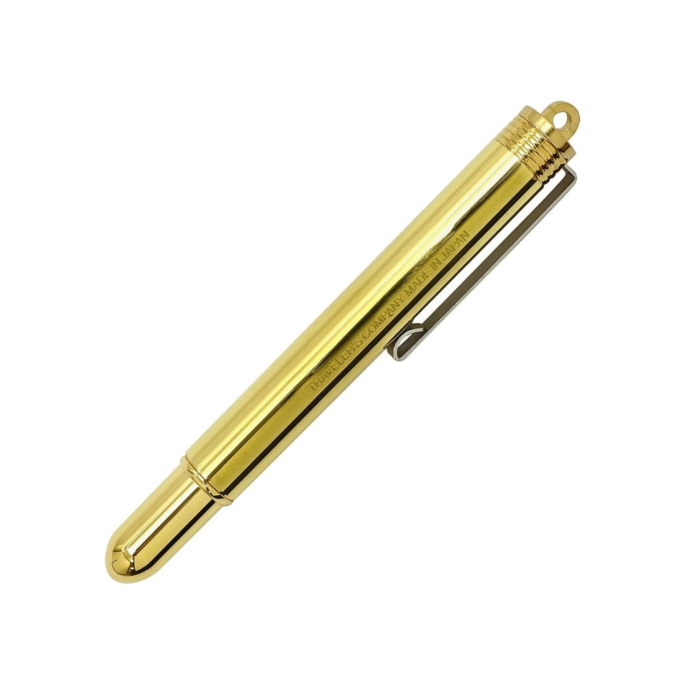 Midori Compact Brass Fountain Pen in gold, fine nib, shown closed with sleek cylindrical body.