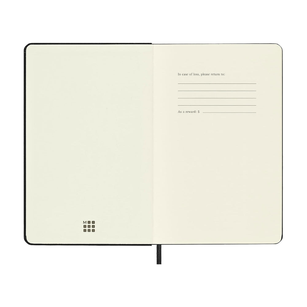 The Journal Shop - Open Moleskine Professional Art Sketchbook medium, black hardcover, displaying smooth ivory sketch paper.
