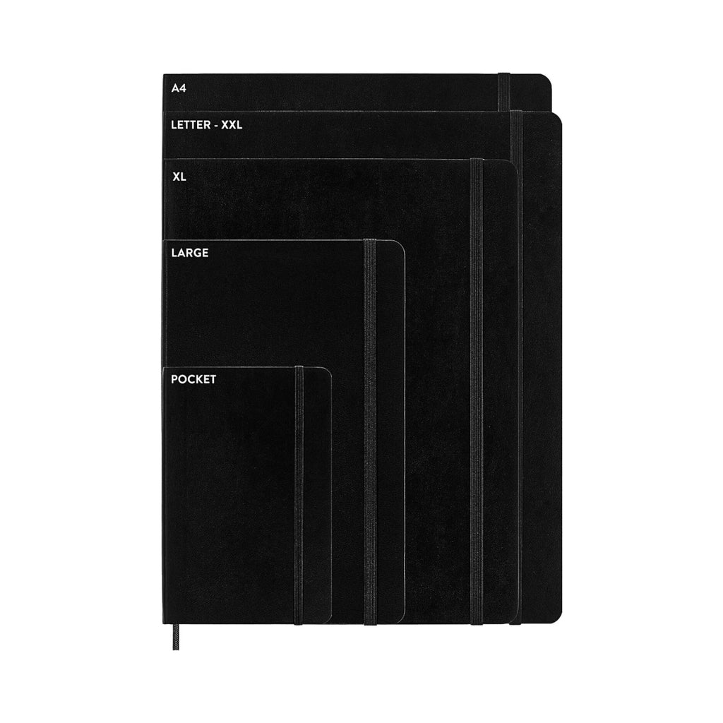 Stack of Moleskine Classic Soft Cover Notebooks in varying sizes with elastic closures visible.