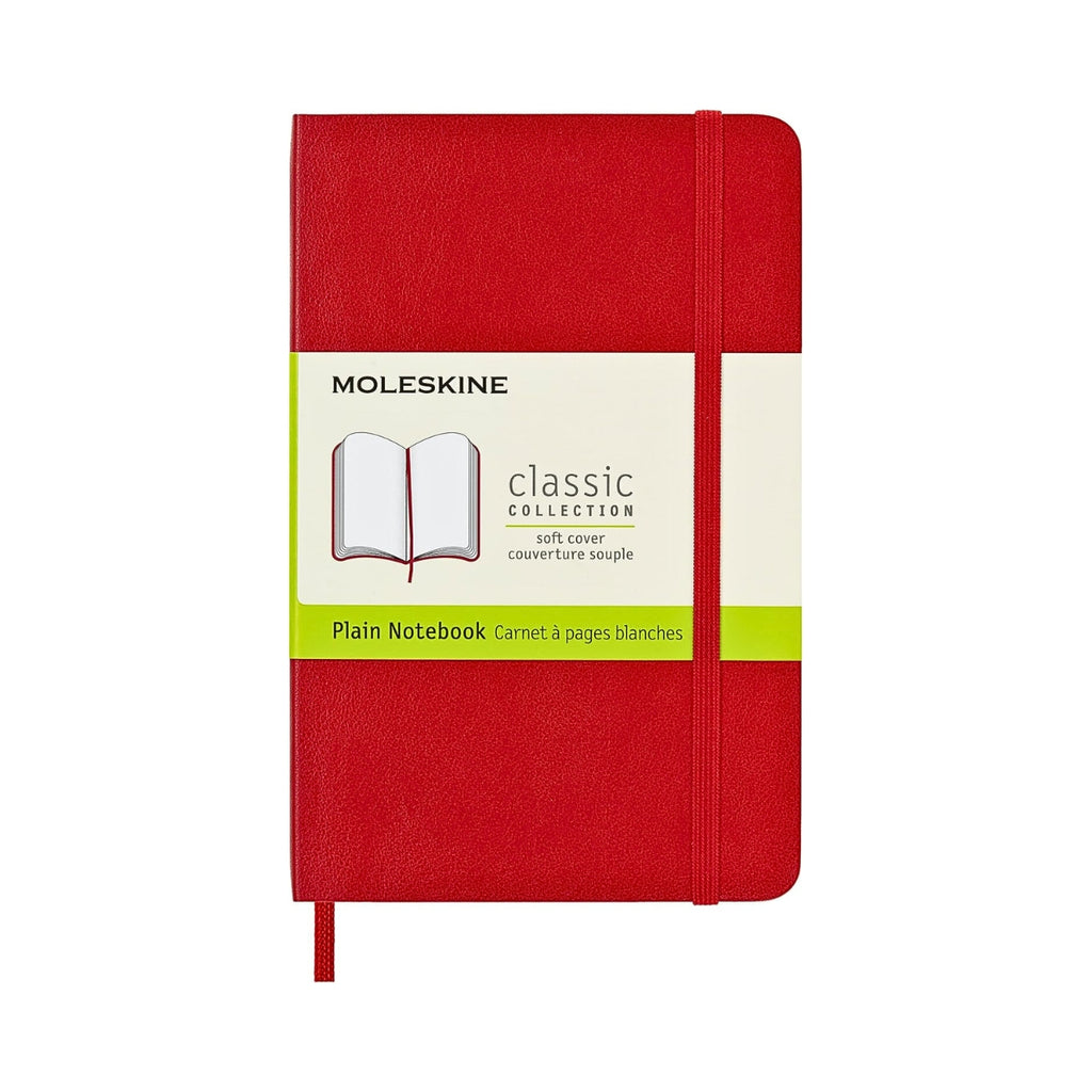 Front view of the scarlet red Moleskine Classic Pocket Soft Cover Notebook Plain with label.