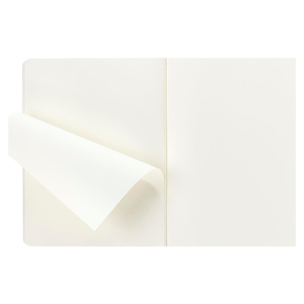 Myrtle Green Moleskine Extra Large Cahier with inner cream pages partially folded.