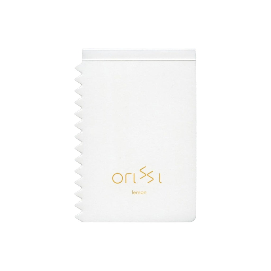 Front cover of the Orissi notepad labelled ‘lemon’ with orange-yellow print.