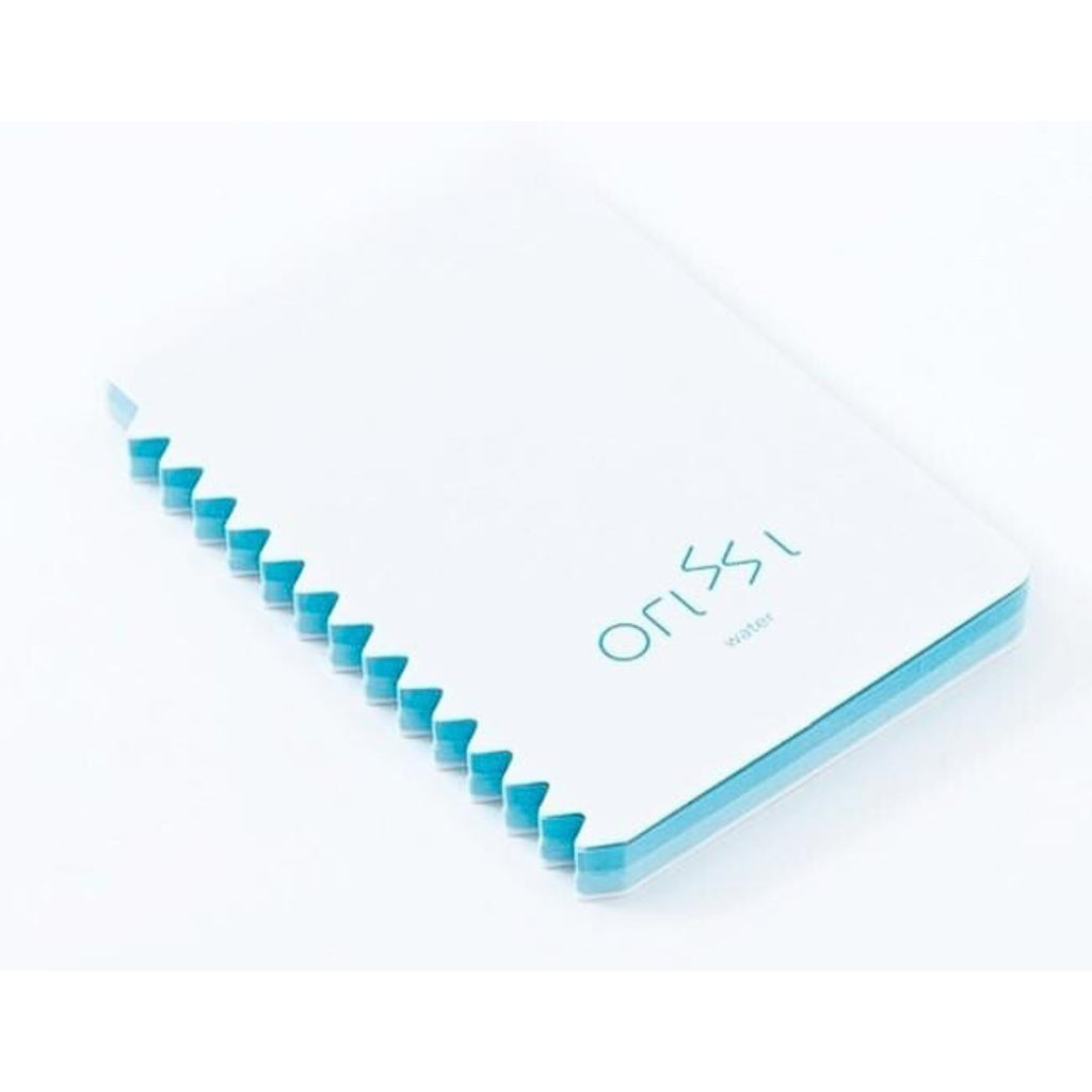 Angled view of Orissi notepad with blue inner pages and zigzag edge, labelled ‘water’.