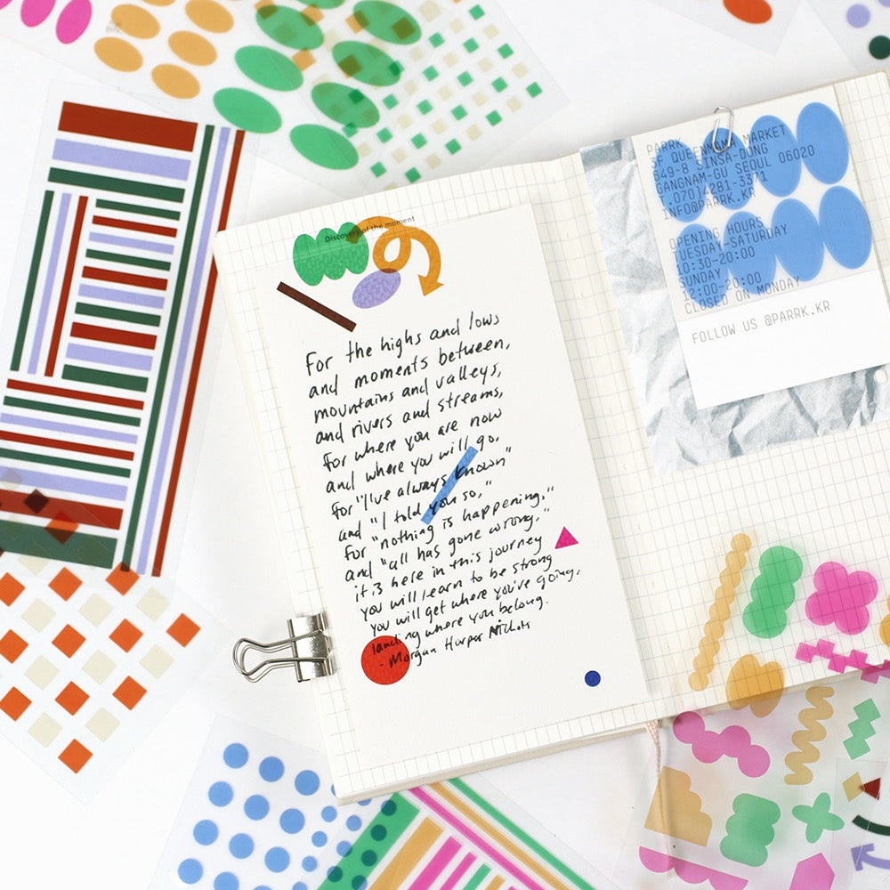 Paperian transparent pigment stickers in various shapes and colours.