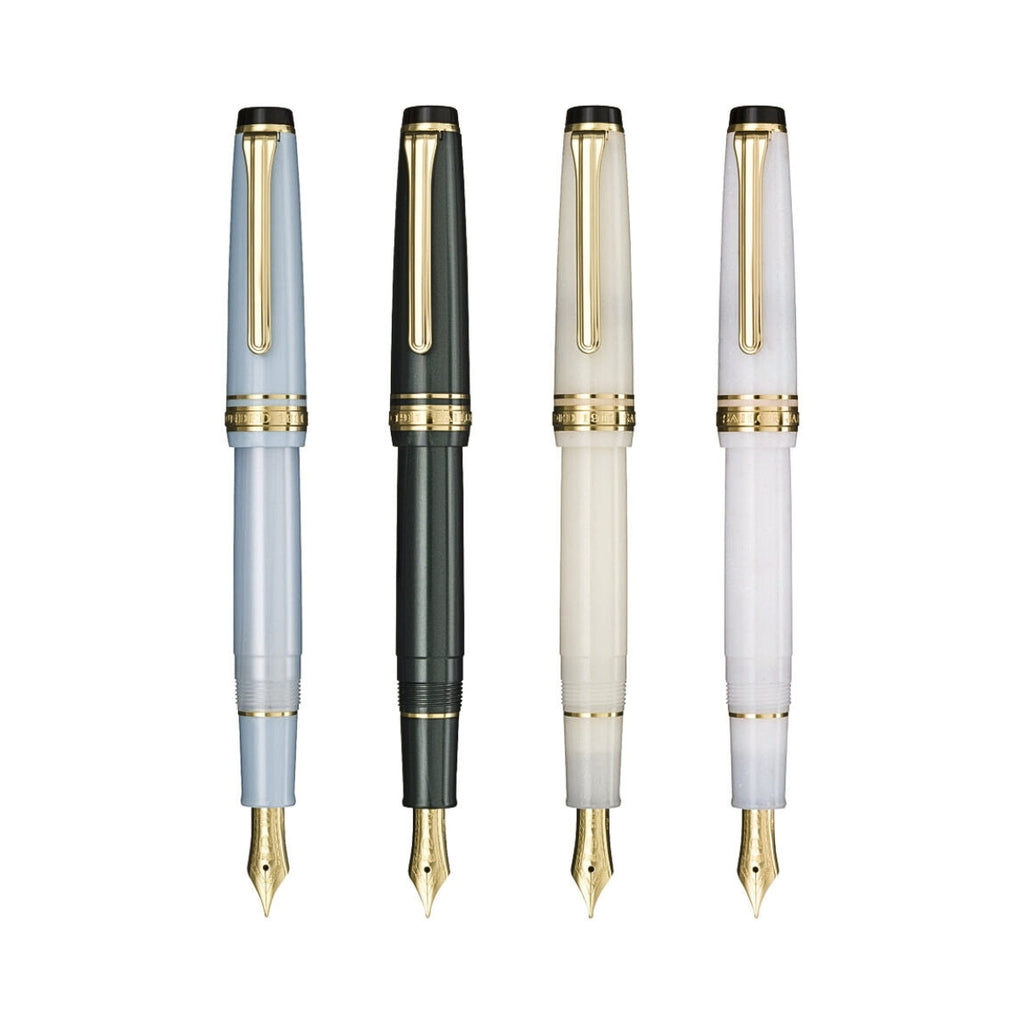 Four Sailor Shikiori Setsugetsu Soraha Fountain Pens in pastel blue, deep green, ivory, and pearl white with gold accents and nibs.