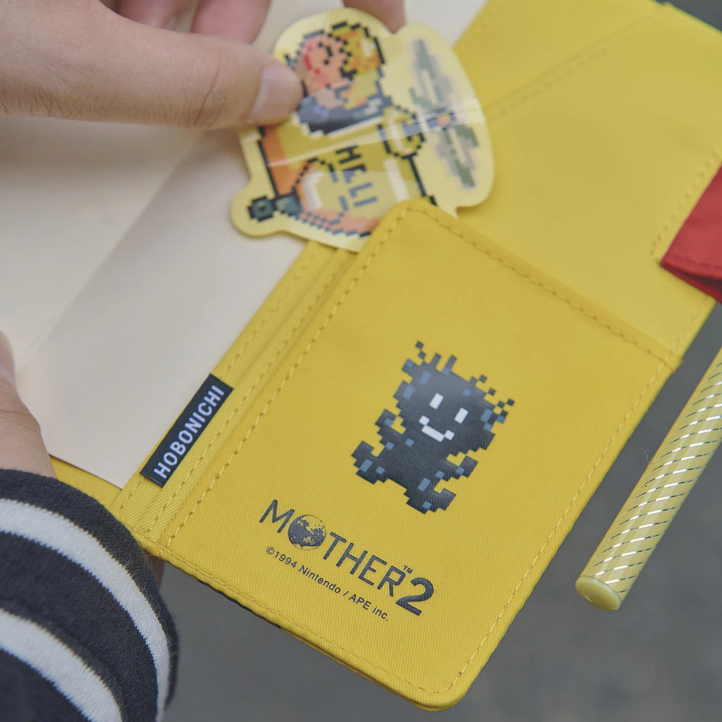 Hobonichi 2024 A6 Planner Cover [MOTHER: Attention!] - The Journal Shop