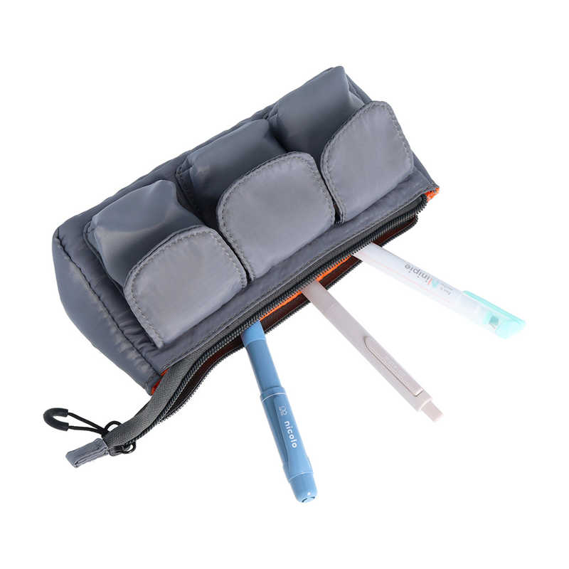 Grey Sun-Star Gears Pack multi-function pencil case with three front pockets and pens inside.