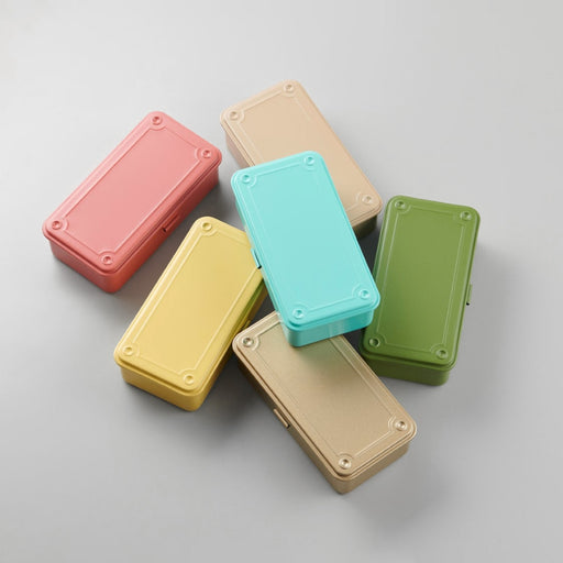 Top-down view of TOYO STEEL T-190 toolboxes in assorted pastel colours arranged in a circular pattern on a light background.