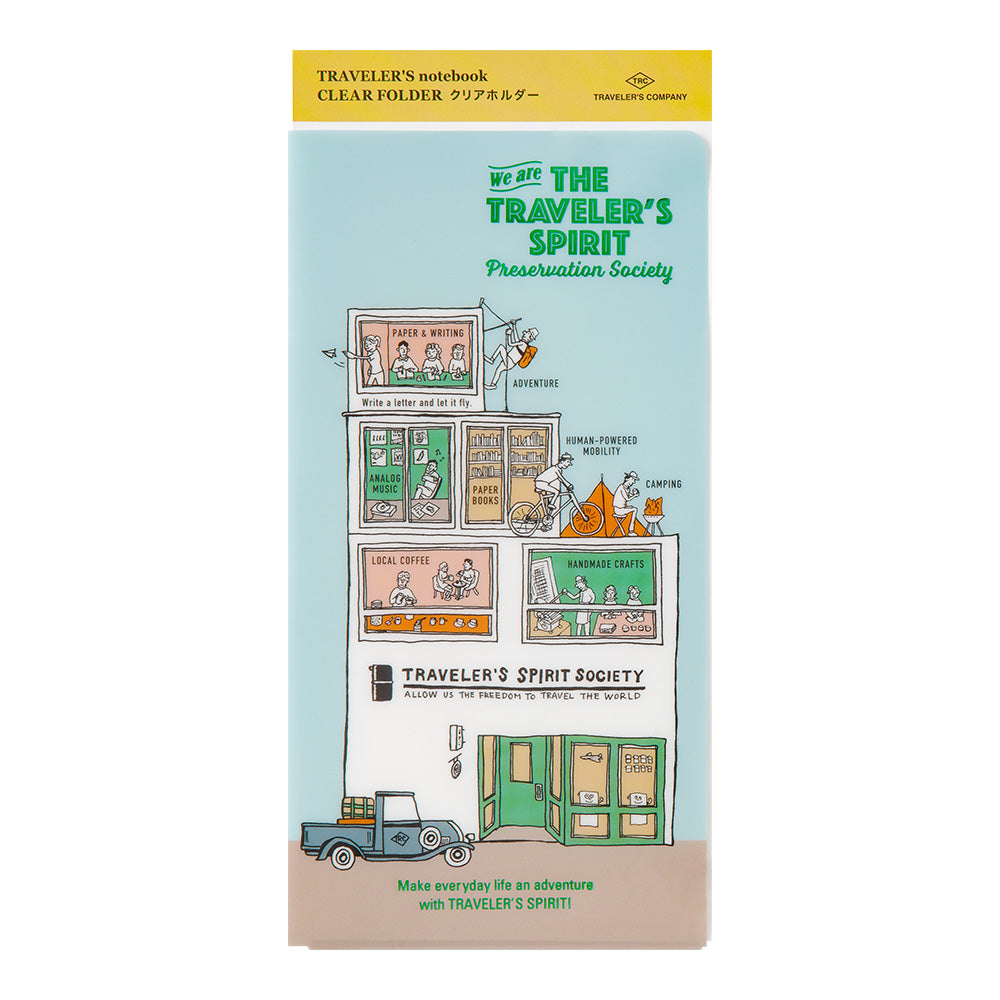 Front view of Traveler’s Notebook 2026 Edition Clear Folder Regular Size with illustrated townhouse and shopfront design.