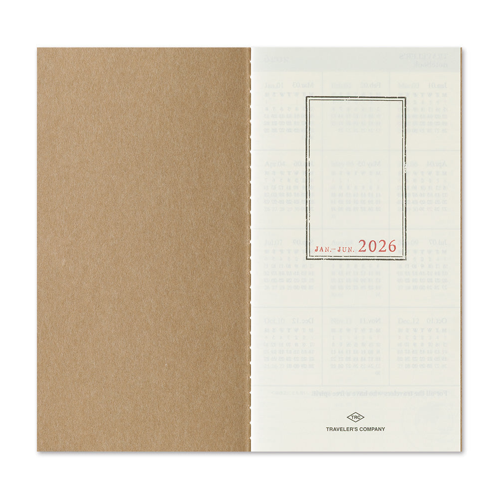 Introductory page of Traveler’s Notebook 2026 Weekly Vertical Diary Refill Regular Size set of two, with title sheet and kraft paper.