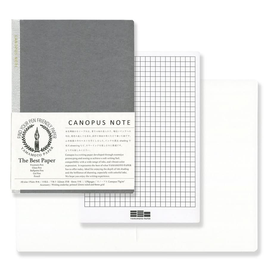 The Journal Shop - Yamamoto Paper Canopus Notebook A5 plain shown with grey cover and branded sleeve.