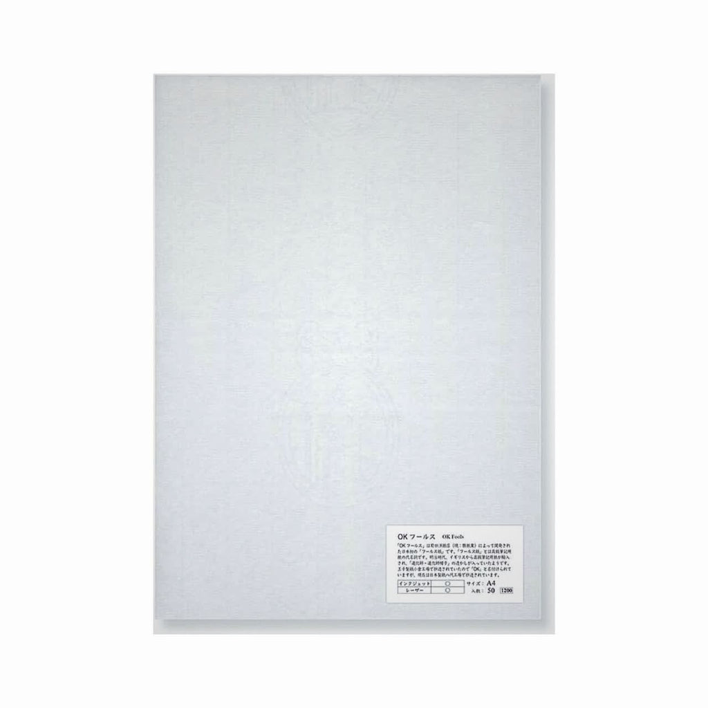 Full view of OK Fools A4 writing paper pad with visible watermark texture and product label in lower corner