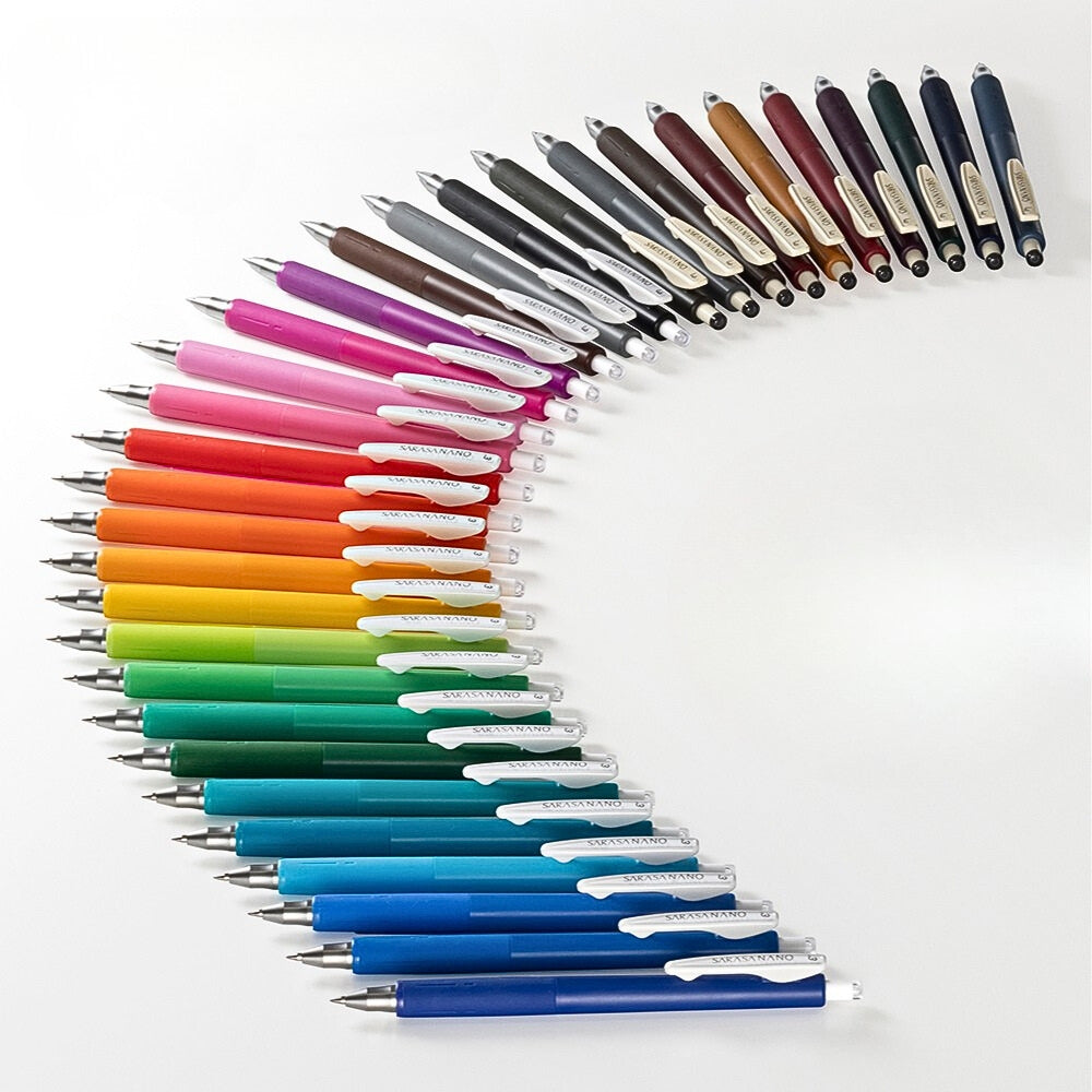 The Journal Shop - Full range of Zebra Sarasa Nano Vintage Colour Gel Pens arranged in a rainbow arc showing all available colours.