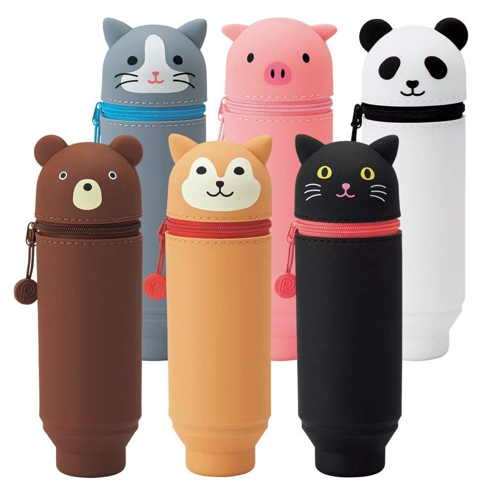 Lihit Lab PuniLabo Shiba Standing Pencil Case, crafted from soft silicon rubber, standing upright on a desk with its interior visible, ready to organise your pens and pencils.